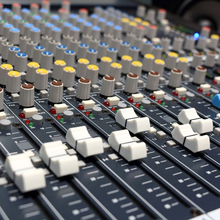 Close-up photo of an Allen and Heath MizWiz analogue sound desk.